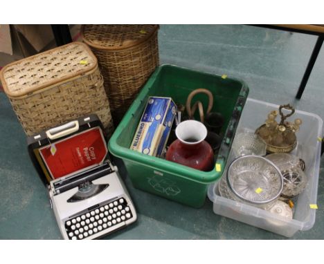 Two wicker laundry baskets, vintage typewriter and two boxes of vases, glassware, cruet set etc 
