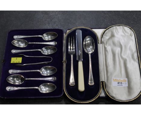 Cased set of silver teaspoons and tongs and cased set of knife, fork and spoon