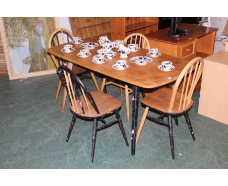 Mid-century Ercol style dining table and four matching chairs