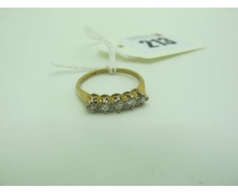A Dainty Five Stone Diamond Ring, graduated claw set, stamped "18ct" "Plat" (finger size M). 