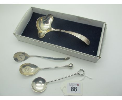 Arts &amp; Crafts Style Hallmarked Silver Preserve Spoon, of plain slender form, together with two further hallmarked silver 