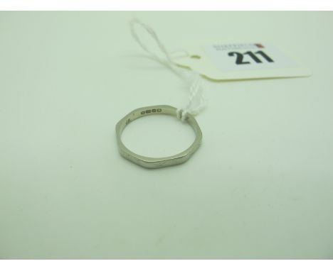 An 18ct White Gold Shaped Band, with engraved detail (finger size O). 