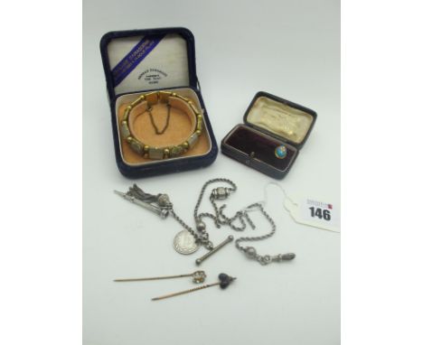 A Ropetwist Albertina, (broken / damaged), suspending T-bar, tassel, small sliding pencil and an 1893 six pence (drilled); a 