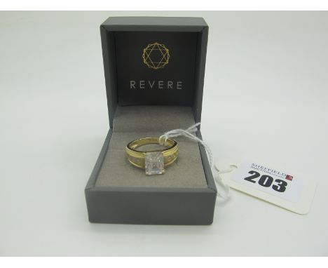 A Modern 14ct Gold Single Stone Dress Ring, rectangular claw set, between wide tapering shoulders with rubover highlights (fi