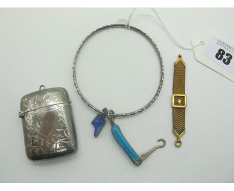 An EPNS Vesta Case, with engraved decoration; together with a bangle suspending small folding button hook with enamel scales,