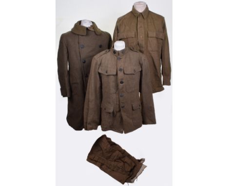 WW1 American Artillery Full Uniform Group, consisting of a four pocket other ranks tunic with bronzed artillery collar discs 