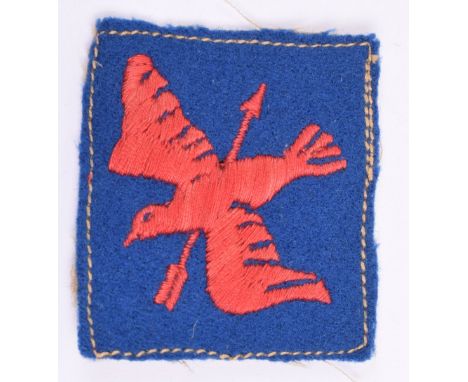 1st Anti-Aircraft Corps Cloth Formation Sign, embroidered red bird with arrow through the centre on blue cloth square backing