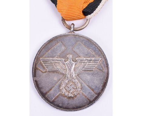 Third Reich Mining Association Service Medal, silvered circular medal with eagle and swastika laid upon crossed tools to the 