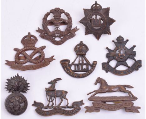 Eight British Officers Bronze Cap Badges, consisting of South Staffordshire regiment with two blade fittings to the reverse a