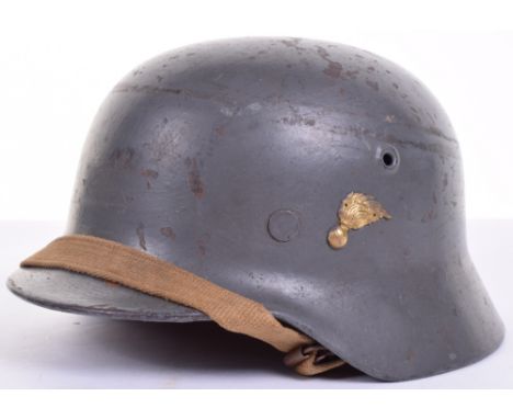 Post WW2 Austrian Gendarmerie Steel Helmet, being a re-issued WW2 German M40 pattern steel helmet, repainted in a light blue 