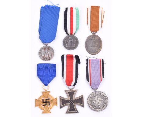 Selection of WW2 German Medals, consisting of 40 year Faithful Service Cross, West Wall campaign medal, zinc Afrika Korps cam