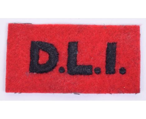 6th Battalion Durham Light Infantry Cloth Shoulder Title, black embroidered D.L.I on red cloth rectangle. Churchill states th