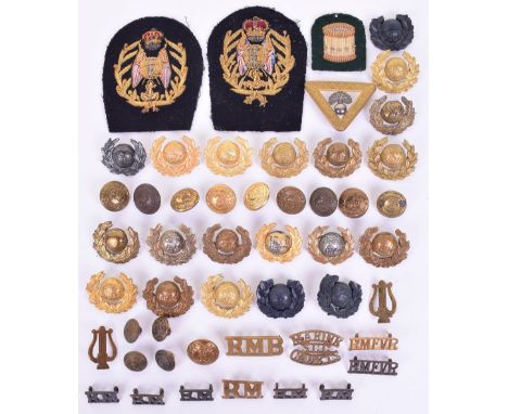Quantity of Royal Marines Badges and Insignia, including various collar badges including officers gilt, other ranks brass and