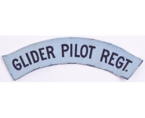 WW2 Printed Glider Pilot Regiment Shoulder Title, dark blue GLIDER PILOT REGT on light blue backing. Good uniform removed exa