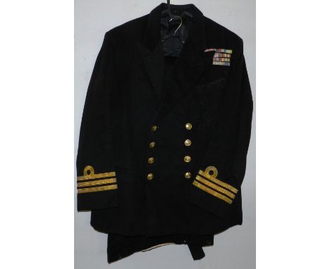 British Navy dress uniform jacket having Gieves label "18-9-58 J R CARR 4045" with Gieves naval brass buttons, bullion triple