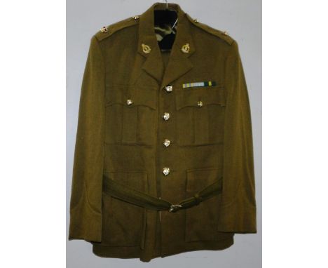 British Army dress uniform khaki green jacket with Royal Army Medical Corps insignia including collar badges and Staybrite bu