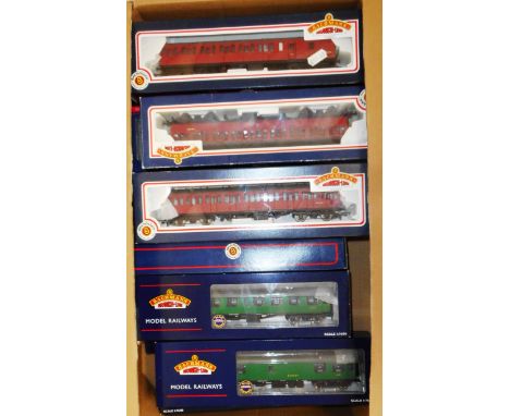 Bachmann 00 gauge. Various carriages etc. 8 x B.R. green, 6 x B.R. crimson Suburbans. All boxed new. (14) 