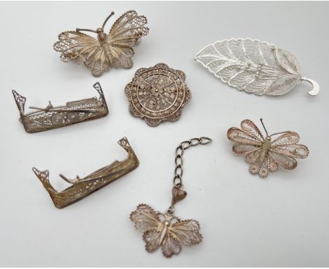 A small collection of vintage silver filigree jewellery items, all with silver number marks to reverse. 2 brooches in the for