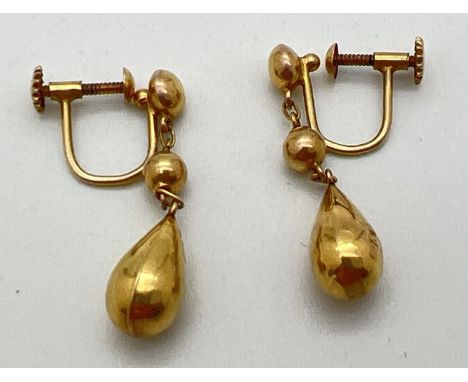 A pair of vintage 9ct gold screw back teardrop drop style earrings. Makers and gold mark to both. Drop approx. 2cm. Total wei