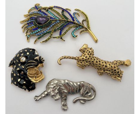 A statement stone set feather brooch together with 3 tiger and leopard brooches. To include a leopard head brooch with black 