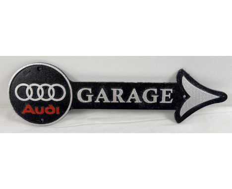 A cast iron Audi Garage wall arrow sign, painted black, silver &amp; red. Approx. 44cm long. 