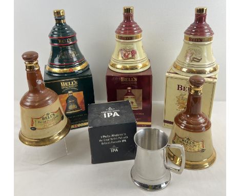 A collection of 5 Wade ceramic Bells whisky bell shaped decanters (empty) together with a boxed Greene King IPA stainless ste