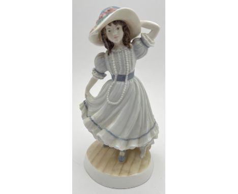 A Limited edition Royal Worcester figurine 'Grandma's Bonnet', the official 1990 National Children's Home figurine. Signed to