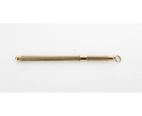 A 9ct gold engine-turned swizzel stick. Hallmarks for Birmingham 1978, approx. 8.5cm - 13cm long overall (3 1/2 - 5 1/8th inc