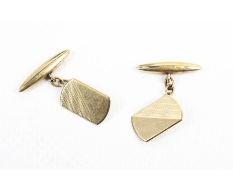 A pair of 9ct gold cufflinks. Each with a part engine-turned oblong panel and a torpedo link with chain inter-links, hallmark
