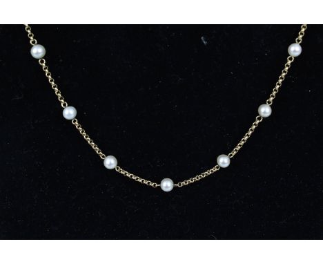 A modern 9ct gold and cultured-pearl necklace. The 18 5mm round cultured-pearls strung at intervals on a belcher link chain t