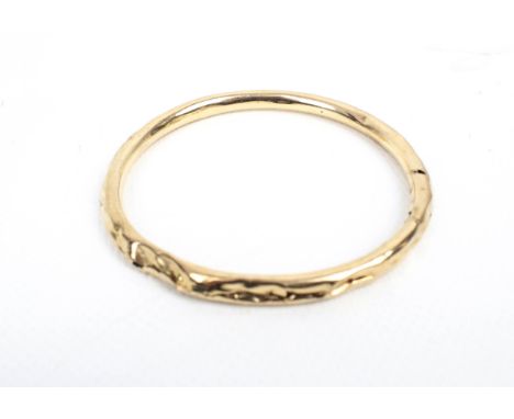 An early 20th century 9ct rose gold hollow slave bangle. Hallmarks for Birmingham 1921, 12.2g Condition Report: Many dents an
