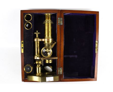 A Negretti &amp; Zambra London monocular reflecting microscope. In a mahogany case, with spare lens, No.8119, case L27.5cm