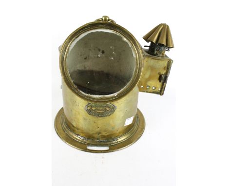 A 19th century brass cased bimble ships compass. Bears makers mark for H. Hughes &amp; Son, Marine Optinions mark to the top,