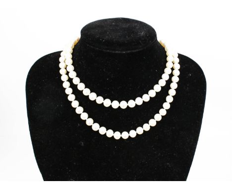 A cultured-freshwater-pearl single row necklace. The beads measure approx. 7.5mm-7.9mm diameter, knotted on a large bolt-ring