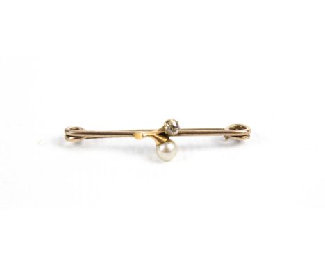 An early 20th century gold, pearl and diamond 'bud' shaped pin brooch. Unmarked, 2.3g gross