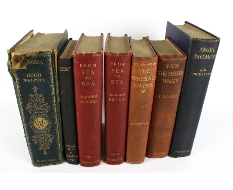 A collection of seven books. Including HG Wells first editions - Star Begotten, 1937, The Wheels of Chance, 1896 with ads (We