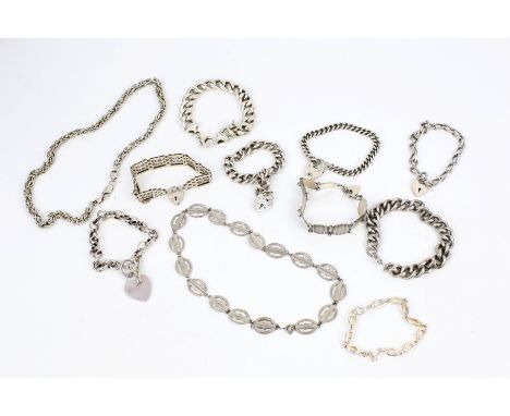 Nine various silver and white metal bracelets and two necklaces. To include five curb bracelets; a gate bracelet; an oval bel