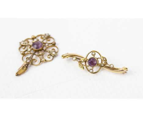 Two Edwardian gold, amethyst and half-pearl openwork floral jewels. Comprising: a 15ct gold scrolling bar brooch, hallmarks f