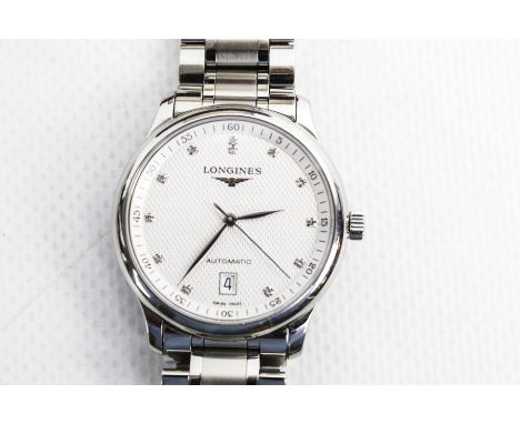 Longines, a gentleman's stainless steel automatic Date bracelet watch. The textured light-cream dial with diamond-dot indicat