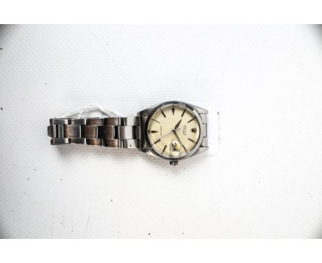 Rolex, Oysterdate Precision, a gentleman's stainless steel bracelet watch, ref. 6694, circa 1965(?).  The light cream dial wi