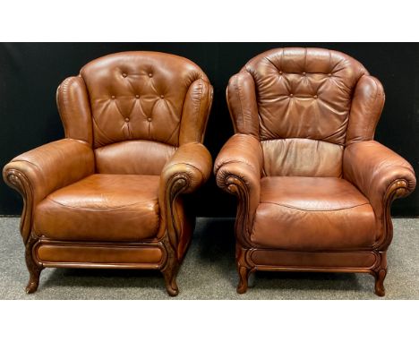 A pair of tan leatherette button-back armchairs, 100cm high x 89cm wide, (2). 