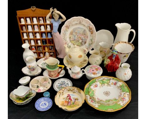 Ceramics - A Nao figure of a girl, 28cm , Coalport plate, 23cm dia conforming dish, Wedgwood ware, others; thimbles including