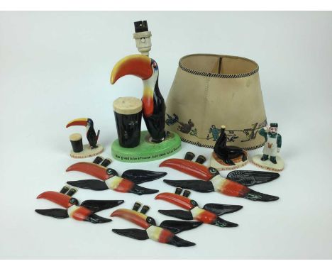 Five Carlton Ware Guinness toucan wall plaques, lamp (broken) and three ‘My Goodness’ figuresCondition report: Good overall c