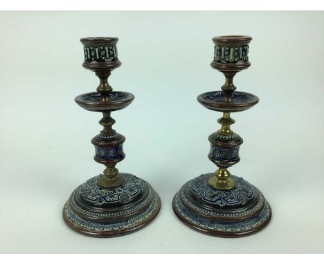 Pair of Doulton Lambeth candlesticks, impressed marks to base, 20.5cm high
Condition report: One stick has a very small nick 