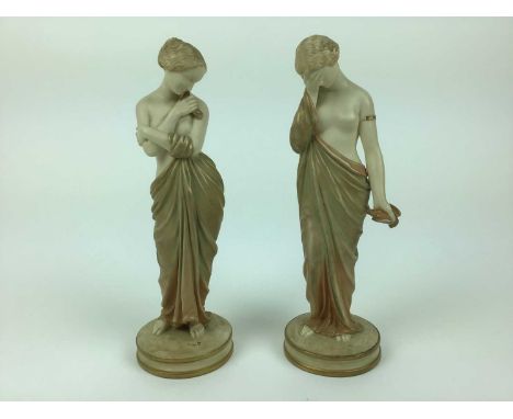 Pair of Royal Worcester Blush ivory semi clad female figures, 25cm high
Condition report: Good condition - some gilt wear com