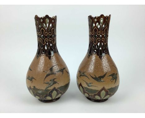Pair of Doulton Lambeth Florence Barlow vases decorated with birds, incised and impressed marks to base, 27.5cm highCondition