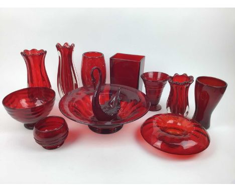 Twelve pieces of Whitefriars Ruby red glass including large bowl, 31cm diameter, controlled bubble vase, 20.5cm high, wave bo