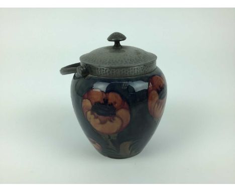 Moorcroft pewter mounted biscuit barrel decorated in the poppy pattern on blue and green ground, impressed marks and blue pai