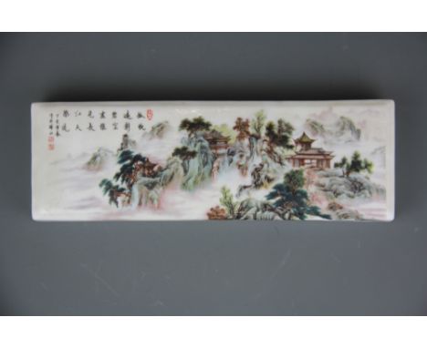 A Chinese porcelain scroll weight, 23.5 x 7.5 x 3cm.