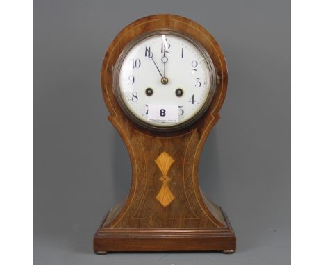 An Edwardian inlaid mahogany balloon clock, H. 31cm.